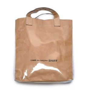 COMME DES GARÇONS PLASTIC PAPER TOTE BAG